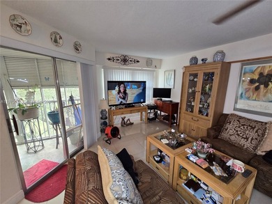 Beautifully maintained 1-bedroom, 1.5-bath condo in the highly on Flamingo Lakes Country Club in Florida - for sale on GolfHomes.com, golf home, golf lot