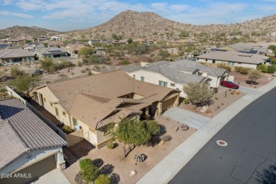 Live in luxury in Estrella in this gorgeous single level home by on Estrella Mountain Ranch Golf Course in Arizona - for sale on GolfHomes.com, golf home, golf lot