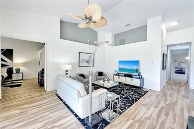 Welcome to effortless living in Palm Colony at Pelican Landing on The Colony Golf and Country Club in Florida - for sale on GolfHomes.com, golf home, golf lot