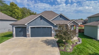 Welcome to comfort and style in this charming 1.5-story reverse on Prairie Highlands Golf Course in Kansas - for sale on GolfHomes.com, golf home, golf lot