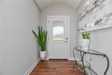 Welcome to comfort and style in this charming 1.5-story reverse on Prairie Highlands Golf Course in Kansas - for sale on GolfHomes.com, golf home, golf lot
