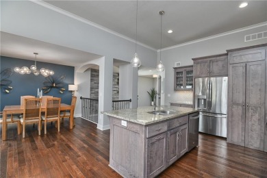 Welcome to comfort and style in this charming 1.5-story reverse on Prairie Highlands Golf Course in Kansas - for sale on GolfHomes.com, golf home, golf lot