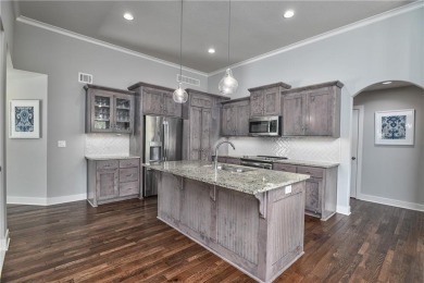 Welcome to comfort and style in this charming 1.5-story reverse on Prairie Highlands Golf Course in Kansas - for sale on GolfHomes.com, golf home, golf lot