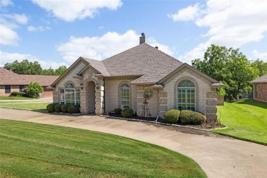 Welcome to this beautifully maintained 4-bedroom, 2-bathroom on Pecan Plantation Country Club in Texas - for sale on GolfHomes.com, golf home, golf lot