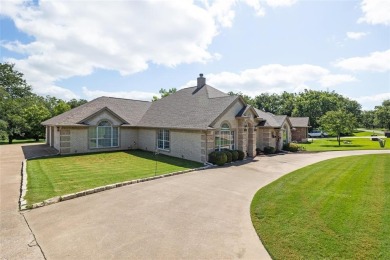 Welcome to this beautifully maintained 4-bedroom, 2-bathroom on Pecan Plantation Country Club in Texas - for sale on GolfHomes.com, golf home, golf lot