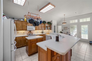 Welcome to this beautifully maintained 4-bedroom, 2-bathroom on Pecan Plantation Country Club in Texas - for sale on GolfHomes.com, golf home, golf lot