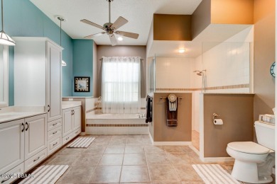 Welcome to your new home! This inviting 3-bedroom, 2-bath home on The Grand Club Cypress Course in Florida - for sale on GolfHomes.com, golf home, golf lot