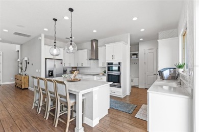 Better than New! Welcome to this stunning home nestled within on Eagle Creek Golf Club in Florida - for sale on GolfHomes.com, golf home, golf lot