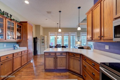 Welcome to your new home! This inviting 3-bedroom, 2-bath home on The Grand Club Cypress Course in Florida - for sale on GolfHomes.com, golf home, golf lot