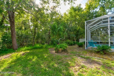 Welcome to your new home! This inviting 3-bedroom, 2-bath home on The Grand Club Cypress Course in Florida - for sale on GolfHomes.com, golf home, golf lot