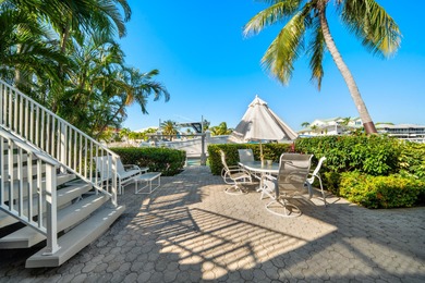 Experience the ease and elegance of true island living in this on Key Colony Beach Golf Course in Florida - for sale on GolfHomes.com, golf home, golf lot
