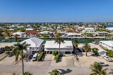 Experience the ease and elegance of true island living in this on Key Colony Beach Golf Course in Florida - for sale on GolfHomes.com, golf home, golf lot