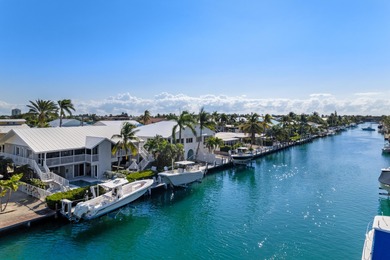 Experience the ease and elegance of true island living in this on Key Colony Beach Golf Course in Florida - for sale on GolfHomes.com, golf home, golf lot