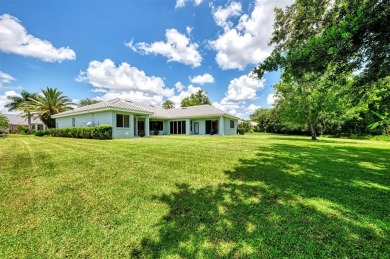 Welcome to your dream home in the tranquil community of Misty on Misty Creek Country Club in Florida - for sale on GolfHomes.com, golf home, golf lot