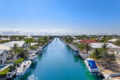 Experience the ease and elegance of true island living in this on Key Colony Beach Golf Course in Florida - for sale on GolfHomes.com, golf home, golf lot