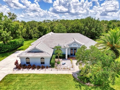 Welcome to your dream home in the tranquil community of Misty on Misty Creek Country Club in Florida - for sale on GolfHomes.com, golf home, golf lot