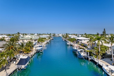 Experience the ease and elegance of true island living in this on Key Colony Beach Golf Course in Florida - for sale on GolfHomes.com, golf home, golf lot