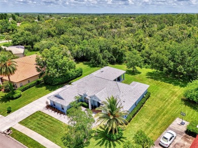 Welcome to your dream home in the tranquil community of Misty on Misty Creek Country Club in Florida - for sale on GolfHomes.com, golf home, golf lot