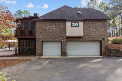 Situated in a premier gated community on a quiet cul-de-sac on Pinewild Country Club of Pinehurst in North Carolina - for sale on GolfHomes.com, golf home, golf lot