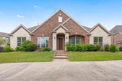 A beautiful custom-built home with golf course views! As you on Pecan Hollow Golf Course in Texas - for sale on GolfHomes.com, golf home, golf lot