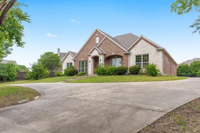 A beautiful custom-built home with golf course views! As you on Pecan Hollow Golf Course in Texas - for sale on GolfHomes.com, golf home, golf lot