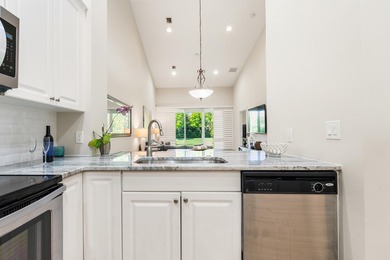 Just Renovated 2 bed 2 bath 2006 corner waterfront townhouse on Oak Harbor Country Club in Florida - for sale on GolfHomes.com, golf home, golf lot