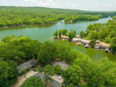 Steps to Lake off back porch with your own private boat dock! on DeSoto Golf Course in Arkansas - for sale on GolfHomes.com, golf home, golf lot