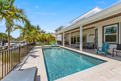 This new construction is a dream come true for boaters and water on Key Royale Club in Florida - for sale on GolfHomes.com, golf home, golf lot