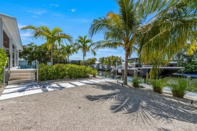 This new construction is a dream come true for boaters and water on Key Royale Club in Florida - for sale on GolfHomes.com, golf home, golf lot