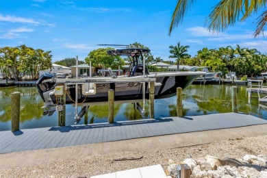 This new construction is a dream come true for boaters and water on Key Royale Club in Florida - for sale on GolfHomes.com, golf home, golf lot