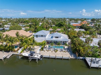 This new construction is a dream come true for boaters and water on Key Royale Club in Florida - for sale on GolfHomes.com, golf home, golf lot