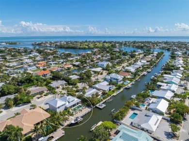 This new construction is a dream come true for boaters and water on Key Royale Club in Florida - for sale on GolfHomes.com, golf home, golf lot