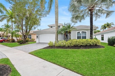 Step into perfection with this move-in-ready 6/4 sanctuary in an on Weston Hills Country Club in Florida - for sale on GolfHomes.com, golf home, golf lot