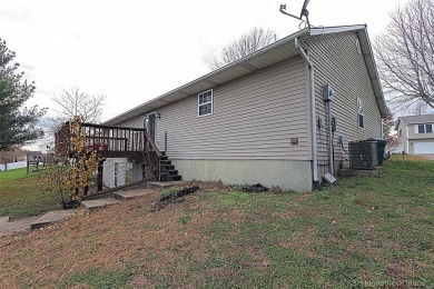 New roof was just installed in November 2024.  This 4 bed 3 bath on Bent Creek Golf Course in Missouri - for sale on GolfHomes.com, golf home, golf lot