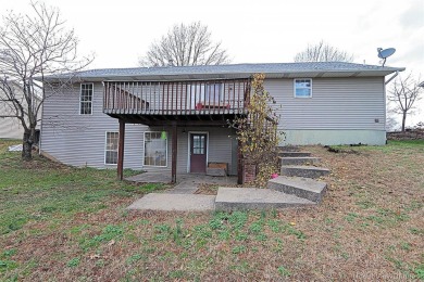 New roof was just installed in November 2024.  This 4 bed 3 bath on Bent Creek Golf Course in Missouri - for sale on GolfHomes.com, golf home, golf lot