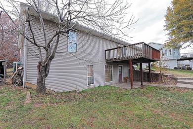 New roof was just installed in November 2024.  This 4 bed 3 bath on Bent Creek Golf Course in Missouri - for sale on GolfHomes.com, golf home, golf lot