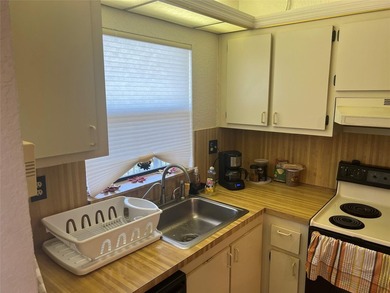 WOW!!! GORGEOUS 2 BEDROOM 2 BATHROOM CONDO (55+ COMMUNITY) ON on Sunrise Lakes Phase IV Golf Course in Florida - for sale on GolfHomes.com, golf home, golf lot