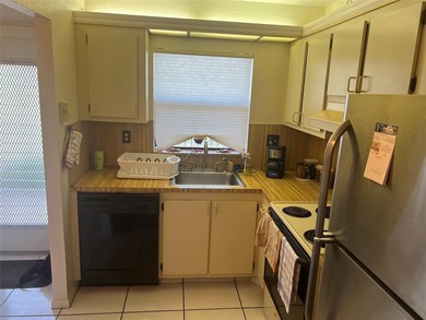 WOW!!! GORGEOUS 2 BEDROOM 2 BATHROOM CONDO (55+ COMMUNITY) ON on Sunrise Lakes Phase IV Golf Course in Florida - for sale on GolfHomes.com, golf home, golf lot