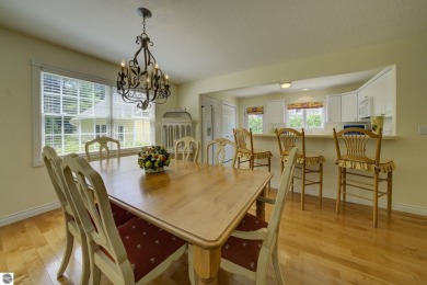 Tucked within the highly sought-after Harborage Park community on Ye Nyne Olde Holles Golf Club in Michigan - for sale on GolfHomes.com, golf home, golf lot