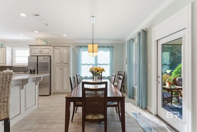 Meticulously maintained home overlooking #3 Lakes fairway and on Peninsula Golf and Racquet Club in Alabama - for sale on GolfHomes.com, golf home, golf lot