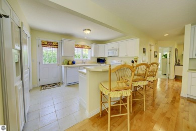 Tucked within the highly sought-after Harborage Park community on Ye Nyne Olde Holles Golf Club in Michigan - for sale on GolfHomes.com, golf home, golf lot