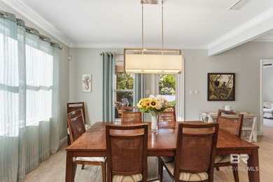 Meticulously maintained home overlooking #3 Lakes fairway and on Peninsula Golf and Racquet Club in Alabama - for sale on GolfHomes.com, golf home, golf lot