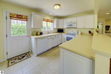 Tucked within the highly sought-after Harborage Park community on Ye Nyne Olde Holles Golf Club in Michigan - for sale on GolfHomes.com, golf home, golf lot