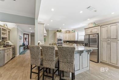 Meticulously maintained home overlooking #3 Lakes fairway and on Peninsula Golf and Racquet Club in Alabama - for sale on GolfHomes.com, golf home, golf lot