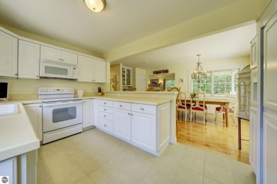 Tucked within the highly sought-after Harborage Park community on Ye Nyne Olde Holles Golf Club in Michigan - for sale on GolfHomes.com, golf home, golf lot