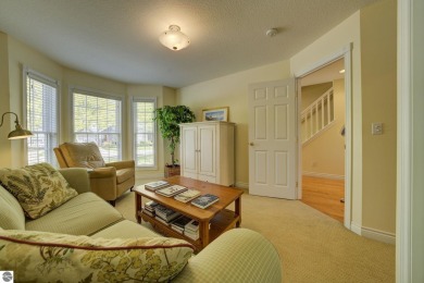 Tucked within the highly sought-after Harborage Park community on Ye Nyne Olde Holles Golf Club in Michigan - for sale on GolfHomes.com, golf home, golf lot