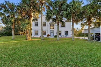 Picture mornings by your sparkling pool, coffee in hand on Wedgefield Golf Club in Florida - for sale on GolfHomes.com, golf home, golf lot