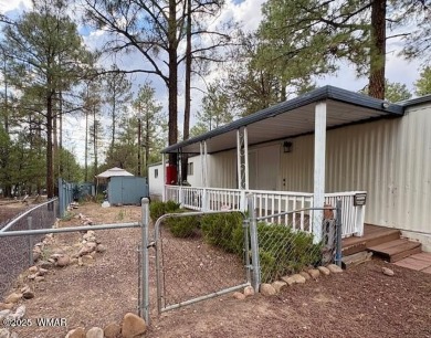 Check out this 2 bedroom, 1 bath home nestled in the tall pines on Bison Golf and Country Club in Arizona - for sale on GolfHomes.com, golf home, golf lot
