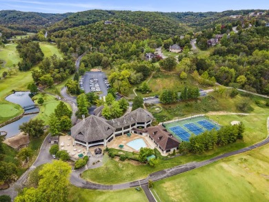 Welcome to your next scenic getaway! This charming two-bedroom on Ledgestone Country Club and Golf Course in Missouri - for sale on GolfHomes.com, golf home, golf lot