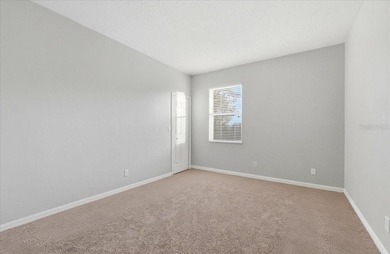 Picture mornings by your sparkling pool, coffee in hand on Wedgefield Golf Club in Florida - for sale on GolfHomes.com, golf home, golf lot